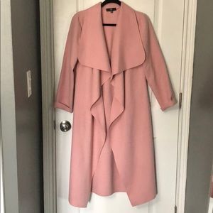 A chic pink waterfall duster coat